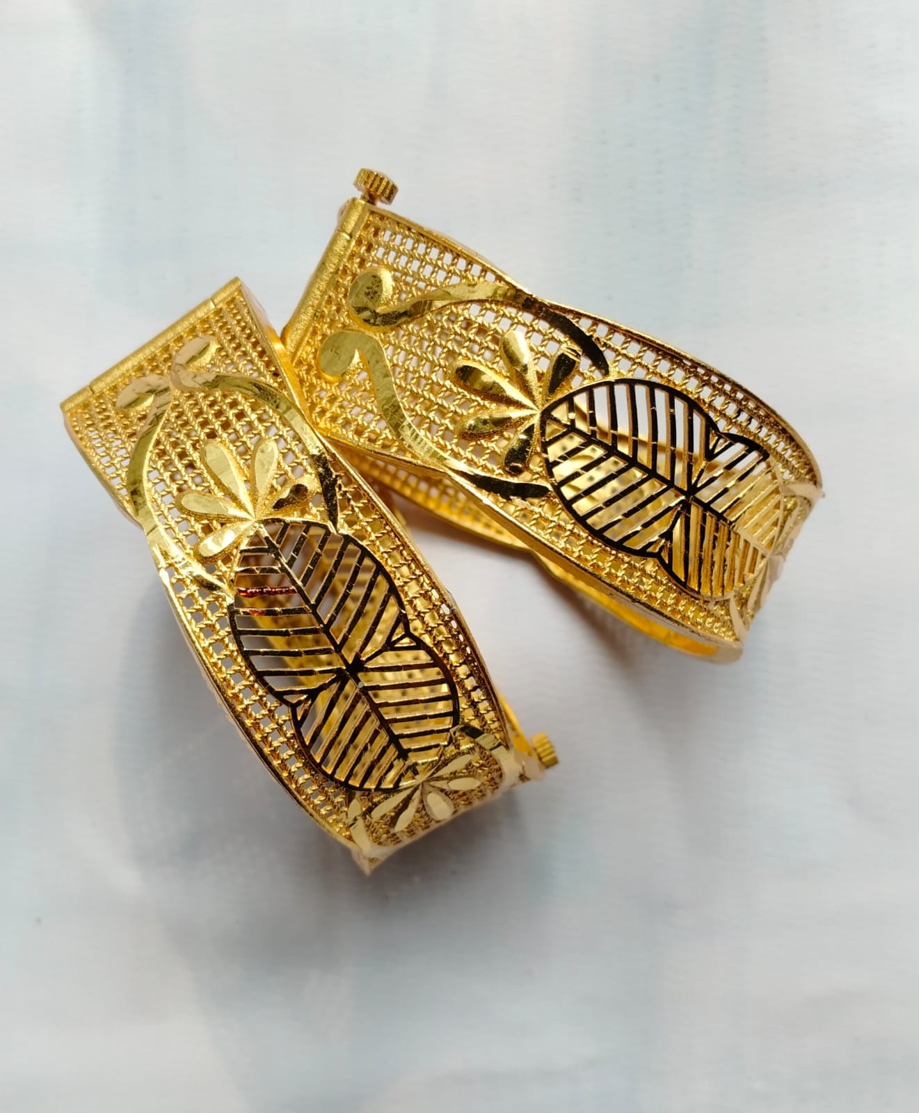 WhatsApp Image 2026-10-08 at 3.56.52 PM Gold-Plated Leaf Motif Open-Work Hinged Bangles (Chur) - Image 1